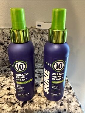 It's a 10 Miracle Shine Spray with Noni Oil - Purple and Green